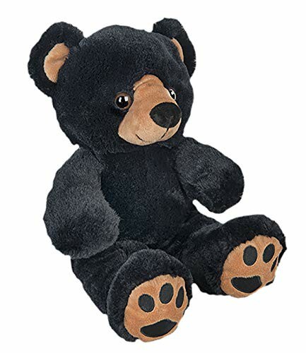 Black teddy bear plush toy sitting.