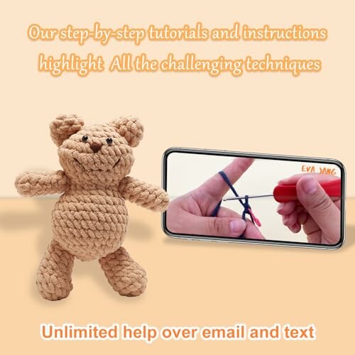 A person holding a smartphone showing a crochet tutorial