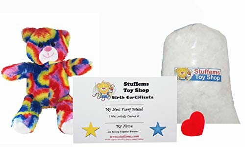 Stuffed animal kit with rainbow bear, stuffing, heart, and birth certificate.