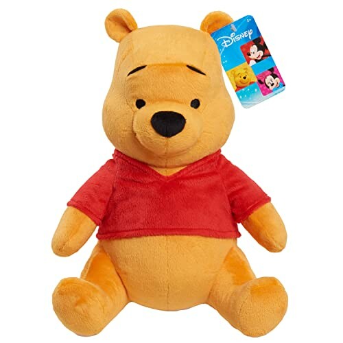 Winnie the Pooh plush toy with red shirt